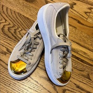 Puma Beige and Gold Sneakers